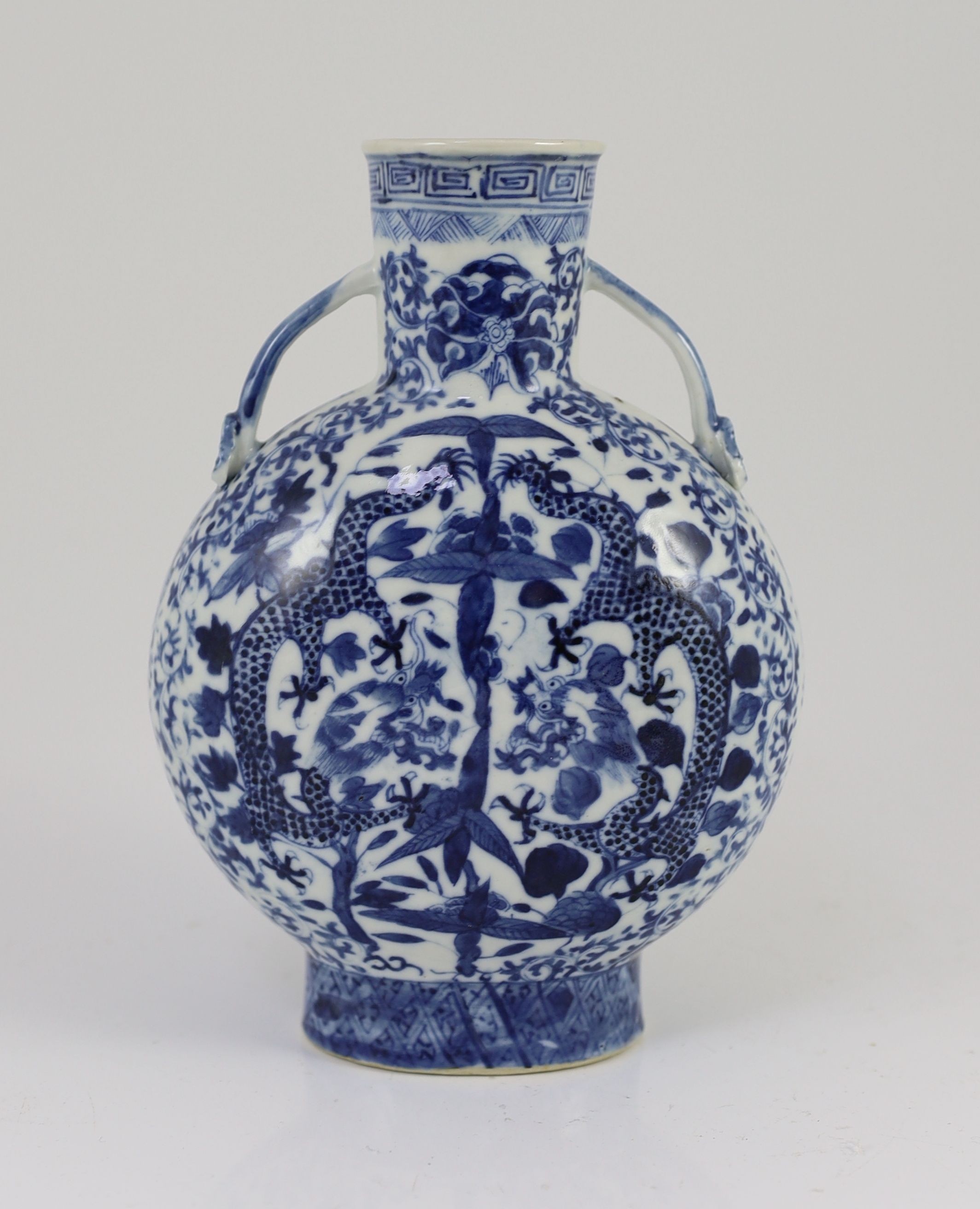 A Chinese blue and white ‘dragon’ moon flask, late 18th century, 20cm high
